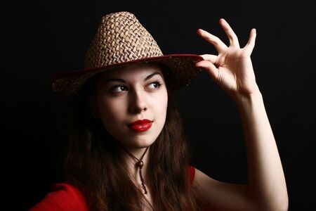 Portrait of the girl in clothes of the cowboy.の写真素材