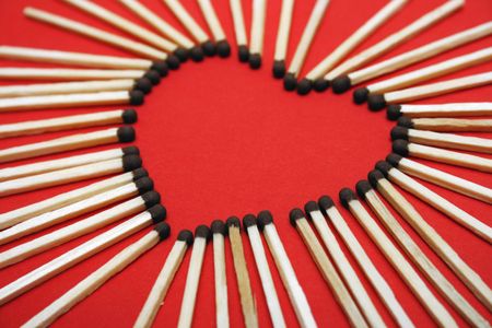  The silhouette of heart is made of matches.の写真素材