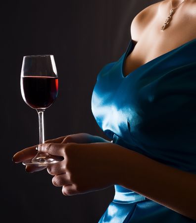 beautiful woman with glass red wine の写真素材