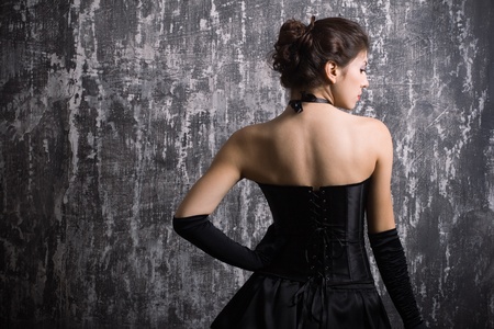 Beautiful fashionable woman in black dress.の写真素材