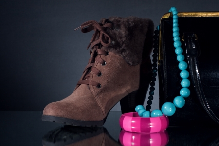 Women winter shoes and jewelry.の写真素材