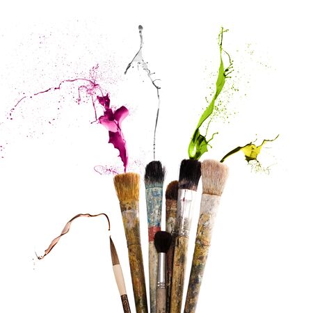 Brush full of colored paintの写真素材