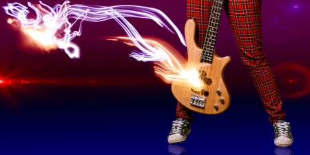 musician on the scene illuminated by a spotlight の写真素材