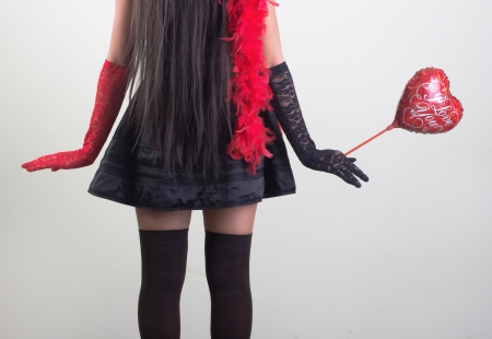 young woman with a heart valentine hands の写真素材