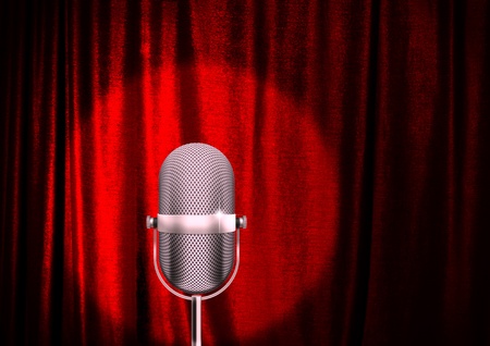 A microphone on a stage with a spotlight on it の写真素材
