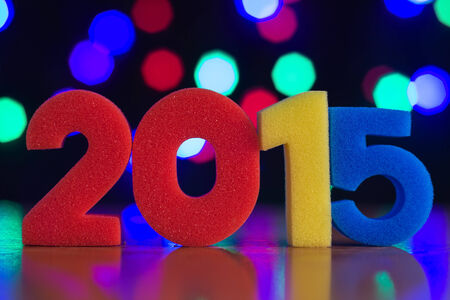 The figure in 2015 against the background of colorful bokeh.の写真素材