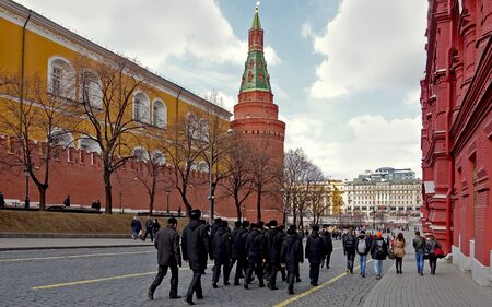 Moscow, Russia. April 14, 2019. A group of cadets walking along the Kremlin wall in Moscow in springのeditorial素材