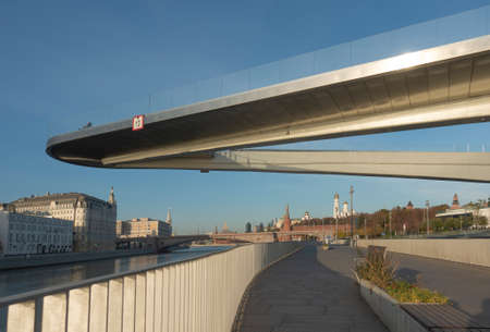 Moskvoretskaya embankment and the floating bridge on a sunny autumn morning in Moscowの写真素材