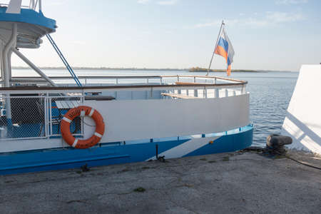 Saratov, Russia. October 13, 2021 Pleasure motor ship at the pier on the Volga in Saratov on a sunny dayのeditorial素材