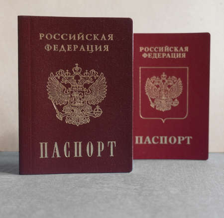 Two passports of a citizen of the Russian Federation - internal and foreign. TEXT TRANSLATION: Russian Federation. The passportの写真素材