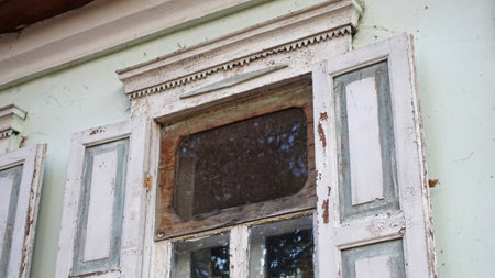 Window of an old Russian house with shuttersの写真素材