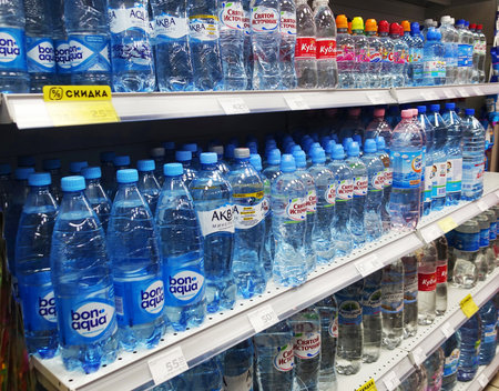 Drinking water on supermarket shelvesの写真素材