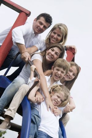 Portrait of family, mom and dad with their four childrenの写真素材