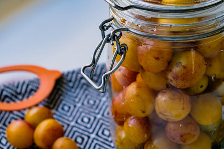 Sterilized mirabelle plums, homemade fruits in syrup for the winter, preserves nutrientsの写真素材
