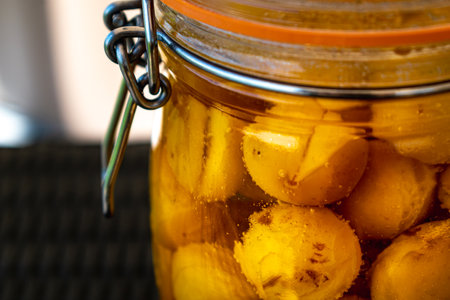 Sterilized mirabelle plums, homemade fruits in syrup for the winter, preserves nutrientsの写真素材