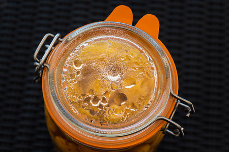 Sterilized mirabelle plums, homemade fruits in syrup for the winter, preserves nutrientsの写真素材