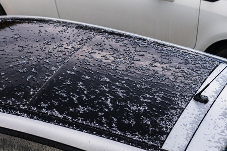 Hail balls in march, natural springtime weather, can cause damagesの写真素材