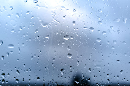 Drops on a window with a beautiful background