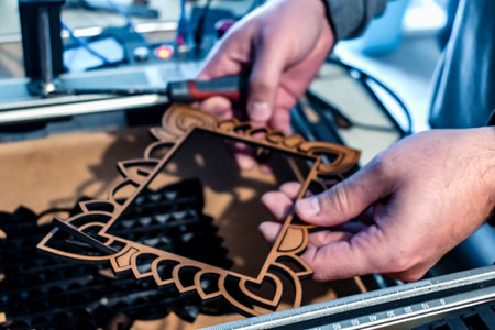 Laser engraving and cutting, using reclaimed wood, upcycling conceptの写真素材