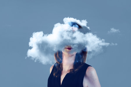 Mental health, woman with her head in a cloud, introvert, mental load, overstimulated