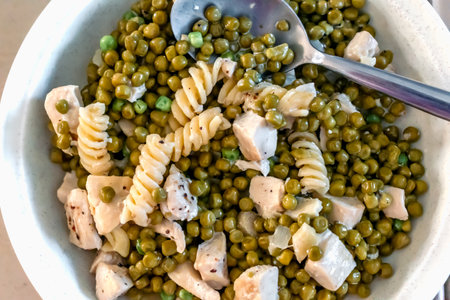 Healthy dish with peas, carbohydrates and white meatの写真素材