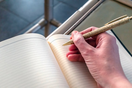 Woman writing in a notebook