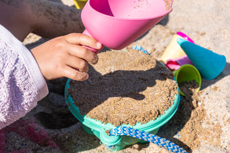 Child playing on a beach, good activity and sport for health and mental health