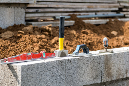 Handyman working on a construction site with tools