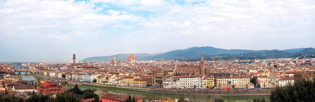 A panoramic view of the city of Florence in Italy with rive Arno in the foreground.の写真素材