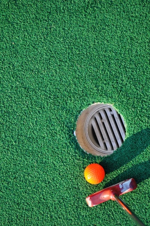 Mini golf and green backgroundの写真素材