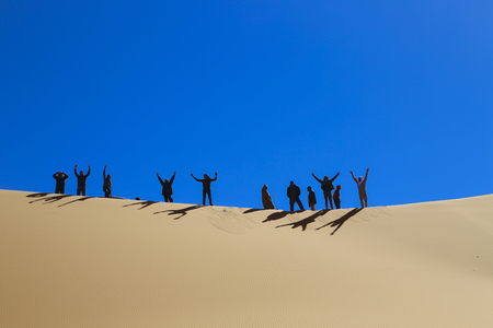 People over Sandの写真素材