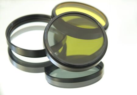 Photo, lens refracting light for the camera isolated on a white backgroundの写真素材