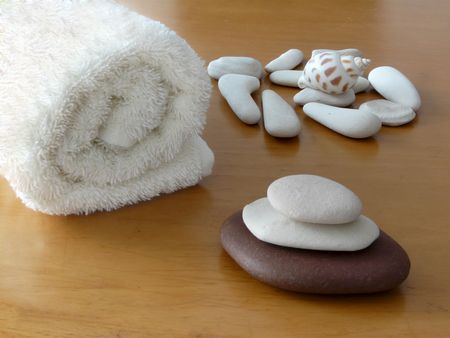 Towel and zen stones. Shallow DOF.