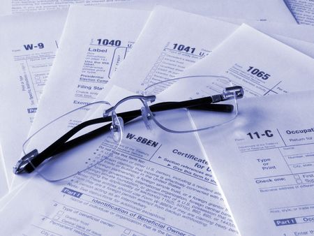 Taxes forms and glassesの写真素材