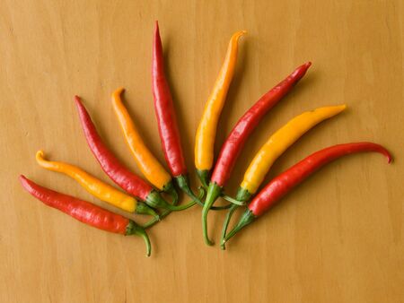 Red and yellow chili peppers.
