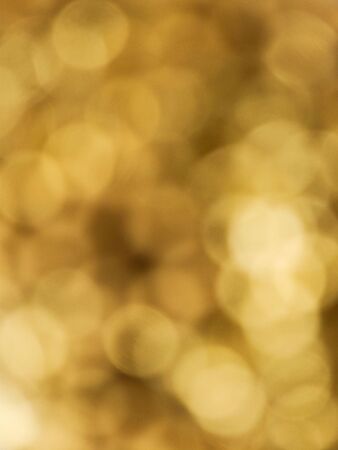 Abstract background of golden holiday lightsの写真素材