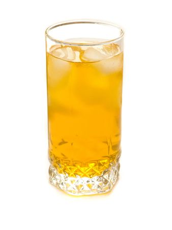 Glass with ice and apple juice, isolated over white background.の写真素材