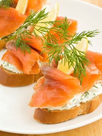 Sandwiches with smoked trout, lemon and fennel. Shallow dof.の写真素材