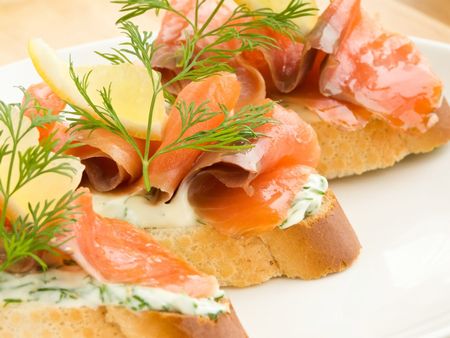 Sandwiches with smoked trout, lemon and fennel. Shallow dof.の写真素材