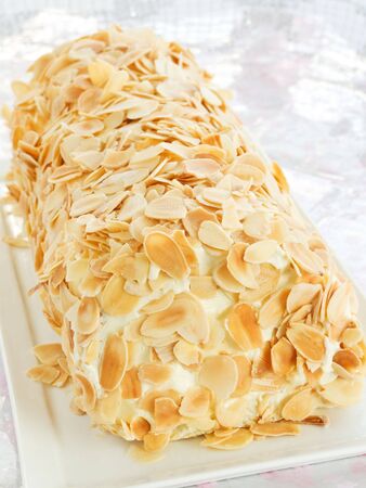 Homemade christmas white yule log. Shallow dof.の写真素材