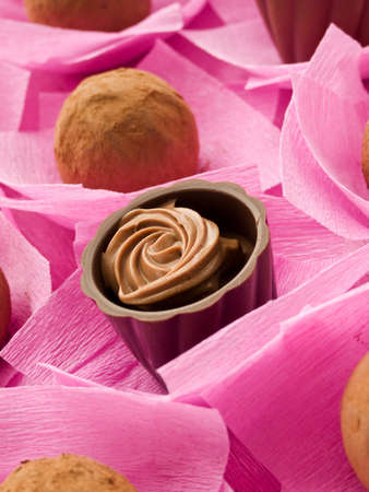 Chocolate truffles and pralines for Valentine's Day. Shallow dof.
