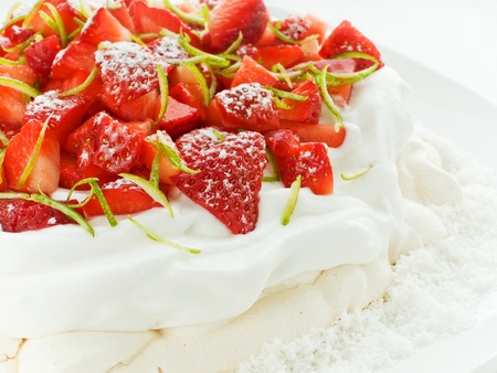 Plate with delicious strawberry Pavlova dessert. Shallow dof.の写真素材