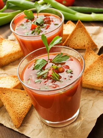 Glasses with fresh gazpacho and croutons. Shallow dof.の写真素材