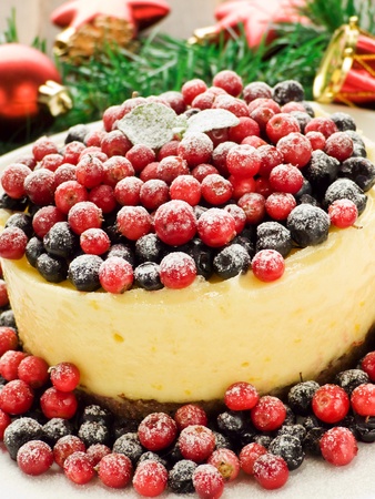 Winter lemon cheesecake with bilberry and cowberry. Shallow dof.の写真素材
