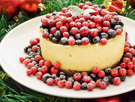 Winter lemon cheesecake with bilberry and cowberry. Shallow dof.の写真素材