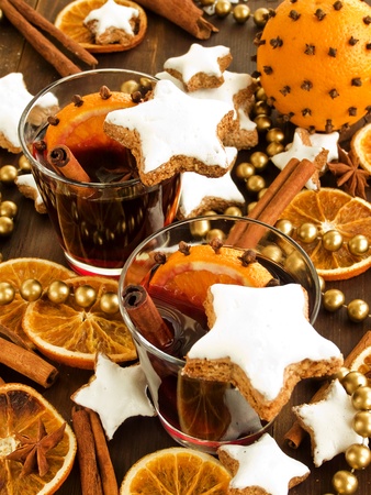 Mulled wine with spices and cinnamon cookies. Shallow dof.の写真素材
