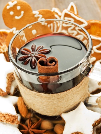 Mulled wine with spices and christmas cookies. Shallow dof.の写真素材