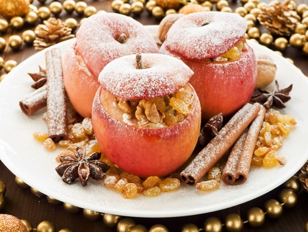 Baked apples with raisin, cottage cheese and walnuts. Shallow dof.の写真素材