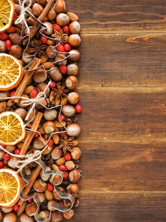 Christmas background nuts, dried oranges, and spices. Viewed from above.の写真素材