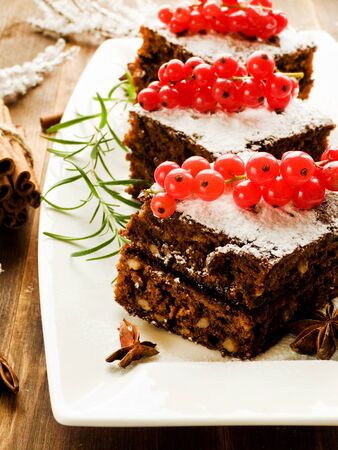 Christmas brownies with whipped sweet sour cream. Shallow dof.の写真素材